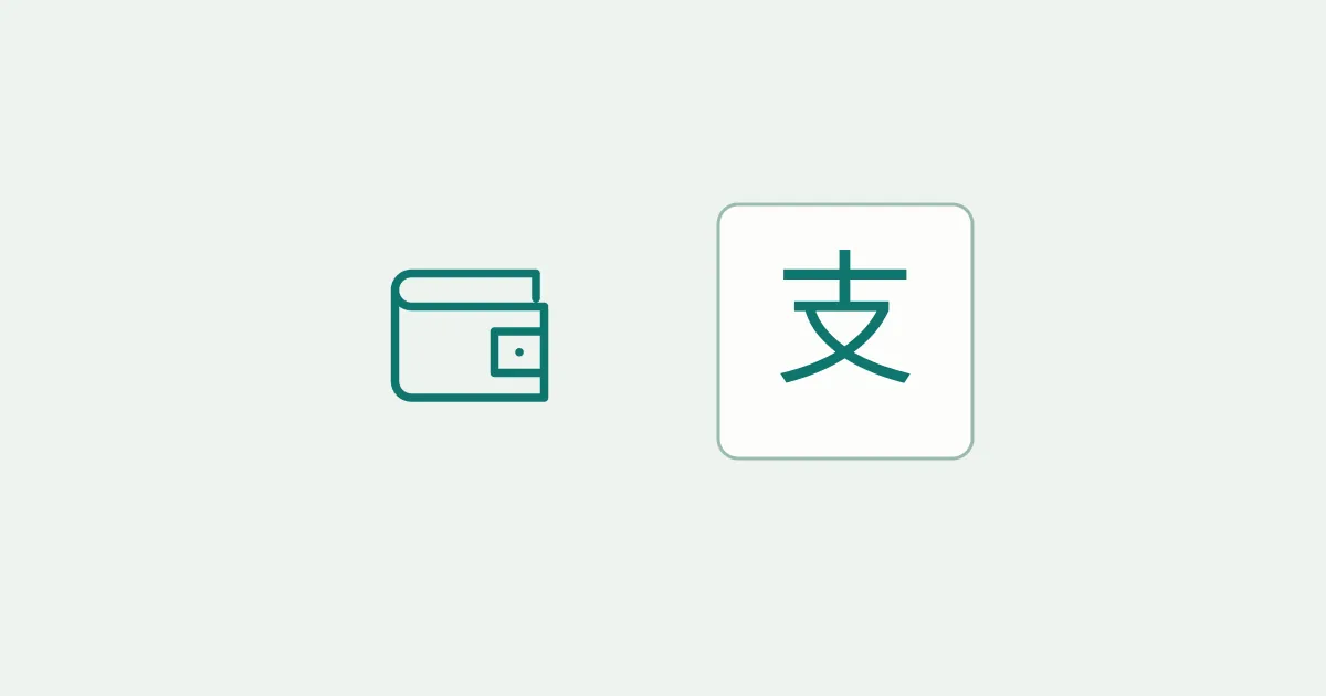 A wallet beside the Alipay symbol, illustrating payment setup before a China trip.